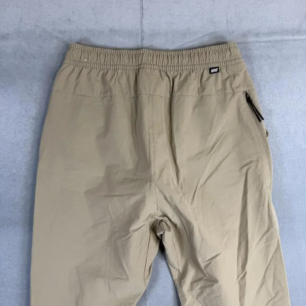 Nike Sportswear Commuter Pants Mens Small Tan Tech Woven Performance DM6621-247